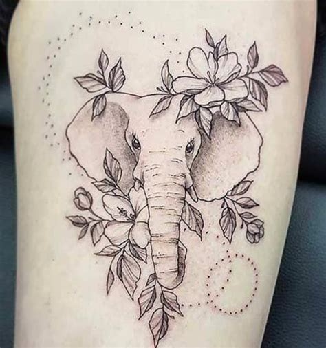 flower elephant tattoo|elephant flower tattoo designs.